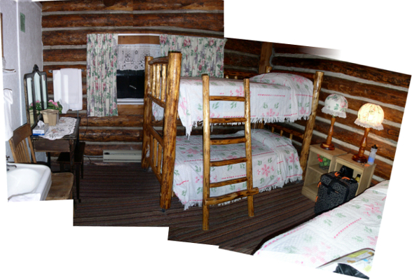 [Multiple photos stitched together to show a room with log walls, a bunk bed with tree-link wood framing and old style coverlets.]